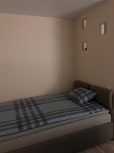Кровать или кровати в номере Narva mnt 23’’