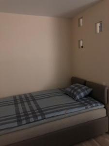 Postel nebo postele na pokoji v ubytování Narva mnt 23’’