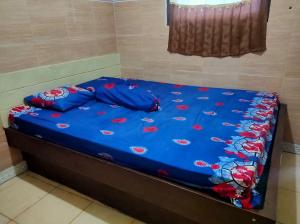 Postel nebo postele na pokoji v ubytování Hotel Abimanyu Bandungan