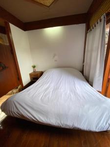 Postel nebo postele na pokoji v ubytování No. 8 Pai