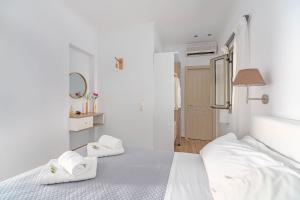 Postel nebo postele na pokoji v ubytování Kosyforema Villas