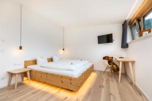 Voodi või voodid majutusasutuse Haus Deutinger toas