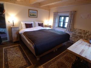 Postel nebo postele na pokoji v ubytování Heuholzmühle Privatzimmer