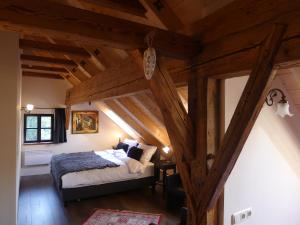 Postel nebo postele na pokoji v ubytování Heuholzmühle Privatzimmer