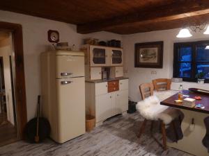 Kuchyň nebo kuchyňský kout v ubytování Heuholzmühle Privatzimmer