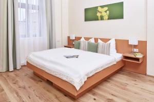 Postel nebo postele na pokoji v ubytování Naturhotel Schloss Kassegg