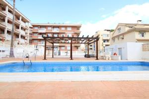 Bazén v ubytovaní Global Properties, Estudio para parejas con piscina en Canet playa alebo v jeho blízkosti