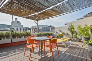 A balcony or terrace at Stay Together Barcelona Apartments