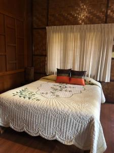 Postel nebo postele na pokoji v ubytování Hotel Siblanburi Resort