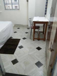 Postel nebo postele na pokoji v ubytování Sukun Guest House