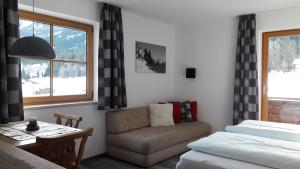 Posteľ alebo postele v izbe v ubytovaní Haus Baumgartner
