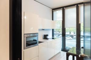 Kuchyň nebo kuchyňský kout v ubytování DUPARC Contemporary Suites