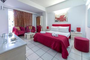 Postel nebo postele na pokoji v ubytování ROY Hotel