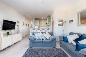 TV a/nebo společenská místnost v ubytování Sunset two bedroom suite
