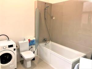 Kylpyhuone majoituspaikassa Modern apartment