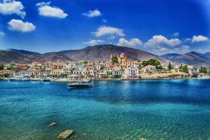 a town on the shore of a large body of water at Executive Rhodes Villa Villa Faros Private Pool 3 Bedrooms Lindos in Líndos