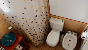 Et badeværelse på Cabaña Sol de Medianoche Delta Tigre + 39 billeder