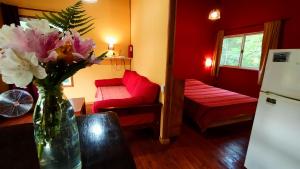 En eller flere senge i et værelse på Cabaña Sol de Medianoche Delta Tigre