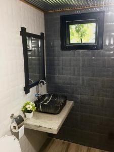 A bathroom at The Loft Resort Kabin Buri