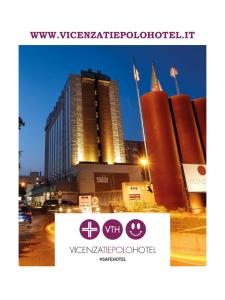 a picture of a building in a city at night at Vicenza Tiepolo Hotel in Vicenza