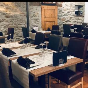 Restoranas ar kita vieta pavalgyti apgyvendinimo įstaigoje Ristorante Con alloggio Val Sole