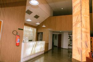 The lobby or reception area at Fênix Hotel Varginha