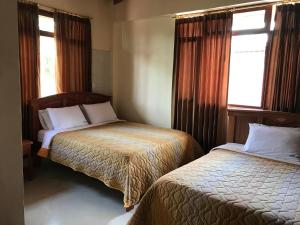 Postel nebo postele na pokoji v ubytování Hosteria Shell