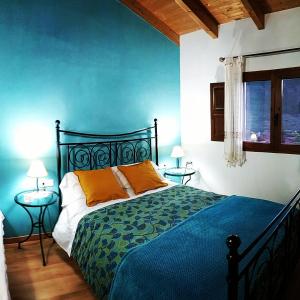 Ένα ή περισσότερα κρεβάτια σε δωμάτιο στο LES ERES DE GÁTOVA-Diente de León