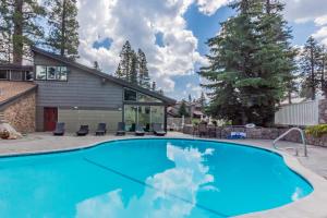 a swimming pool in the backyard of a house at Chamonix # 62 in Mammoth Lakes