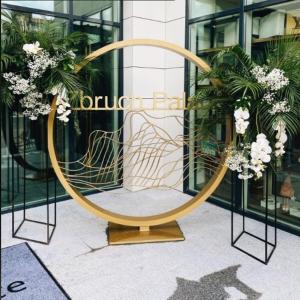 a large gold circle sitting in front of a building at Zbruch Palace Hotel 