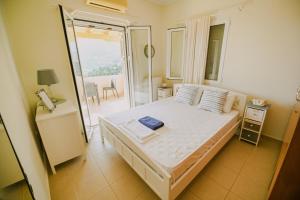 Postel nebo postele na pokoji v ubytování Aloe Villa Chania Crete + 37 fotografií