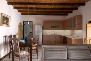 A kitchen or kitchenette at The Quintessential Cretan Villa