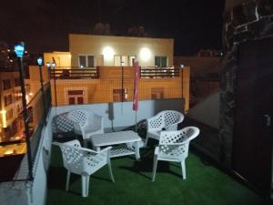 A balcony or terrace at Alcaravaneras Hostel