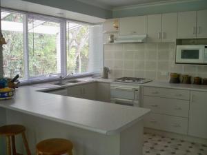 Køkken eller tekøkken på Blairgowrie Relaxation