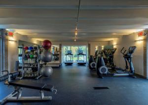 a gym with several treadmills and cardio machines at Aspen Meadows Resort in Aspen