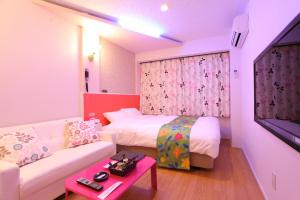 Postel nebo postele na pokoji v ubytování Town Hotel 41