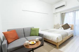 Postel nebo postele na pokoji v ubytování Voga Corte Chidoricho