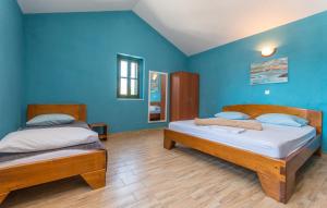 Posteľ alebo postele v izbe v ubytovaní Apartment Porat