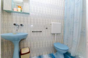 Koupelna v ubytování Apartments Moloco