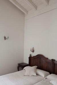 Łóżko lub łóżka w pokoju w obiekcie Hotel IRARAGORRI