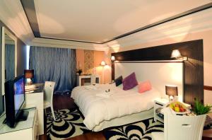 Postel nebo postele na pokoji v ubytování Royal Mirage Fes Hotel