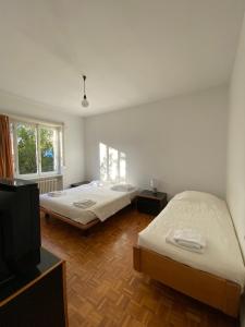 Tempat tidur dalam kamar di Cube 3A Flat
