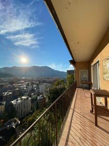 a balcony with a view of the city at Cube 3A Flat in Lugano