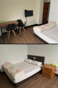 台東市的住宿－小古民宿  ，客房设有两张床、一张桌子和一台电视机。