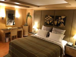 Letto o letti in una camera di Love Tree Motel
