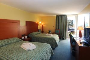 Postel nebo postele na pokoji v ubytování Royal Mirage Fes Hotel