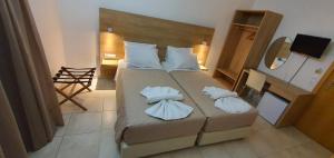 Posteľ alebo postele v izbe v ubytovaní International Hotel