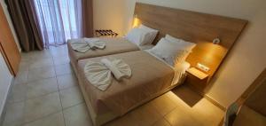 Posteľ alebo postele v izbe v ubytovaní International Hotel