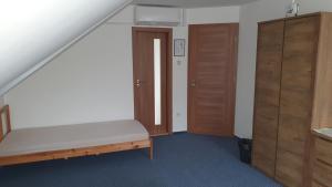 Postel nebo postele na pokoji v ubytování Veszprém Room