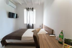 TV a/nebo společenská místnost v ubytování Claudio Rooms